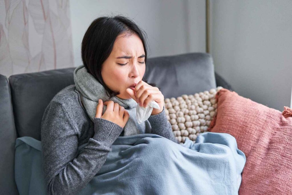 asian-woman-coughing-feeling-sick-sitting-blanket-with-scard-cold-apartment-saving-heati (1)